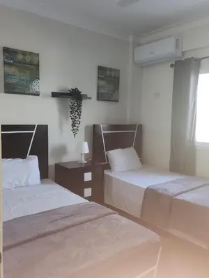 a room with two beds and a window at 2 Bdrm, 1 Bath, Wifi, Near River and Beach, 2R in Paraíso