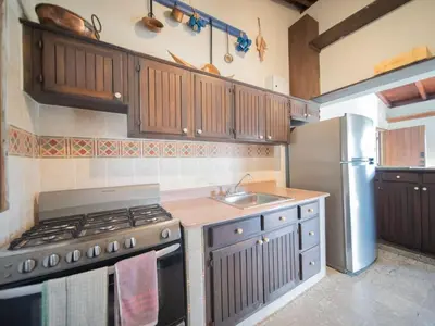 a kitchen with a stove and a sink at HUGE Balcony APT next to HARD ROCK CAFE and Beach in Sosúa