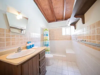 a bathroom with a sink and a toilet at HUGE Balcony APT next to HARD ROCK CAFE and Beach in Sosúa