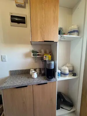 a kitchen with a counter top and a cupboard at Los Corales del Sur- Entire rental unit in Santo Domingo Este, Dominican Republic in Ensanche Savica de Mendoza