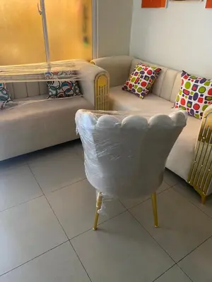 a living room with a couch and a chair at Torre armonía in Punta