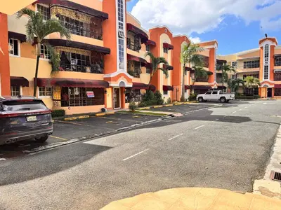 an empty parking lot in front of a building at Cozy Huge and Lovely 3 bedrooms apts 2bathdrooms in La Estrella