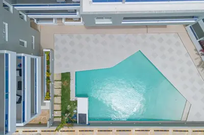 a large pool of water in the middle of a building at Tropical Studio Getaway in Bayahibe in San Rafael del Yuma