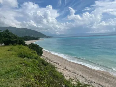 a view of a beach with the ocean at 2 Bdrm, 1 Bath, Wifi, Near River and Beach, 4R in Paraíso