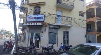 a group of motorcycles parked in front of a building at Tu escape natural - No incluye bebidas, tiene costo adicional in Miches