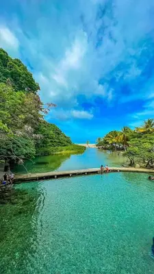 a large body of water with people in it at Casita Linda Playas Rios Wifi Agua HOT AC and more in Paraíso