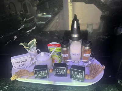 a purple tray with cosmetics and other items on it at Alma Stay Central and cozy in Santa Bárbara de Samaná