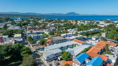 an aerial view of a city with buildings at Cheap Hotel Room in Sosua Center in Sosúa
