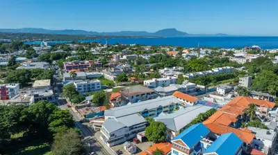 an aerial view of a city with buildings at Cheap Hotel Room in Sosua Strip in Sosúa