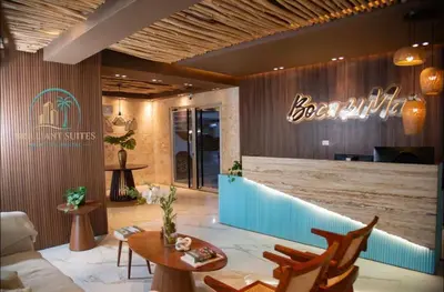 a lobby of a restaurant with a table and chairs at Majestic 2Bd Ocean view Apartment Boca Del Mar III in Boca Chica