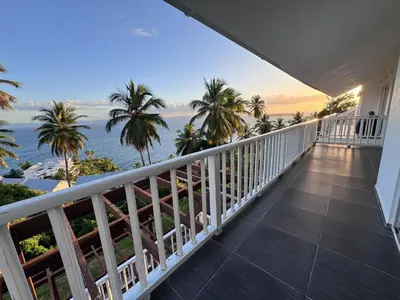 a balcony with a view of the ocean at Spectacular Ocean View 1-Bedroom Condo, Vista Mare, Samana, DR in Villa Ramfis