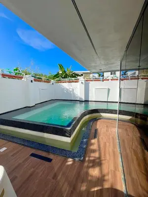 a swimming pool on top of a house at Villa fantastica Pool privada y centrica in Las Terrenas