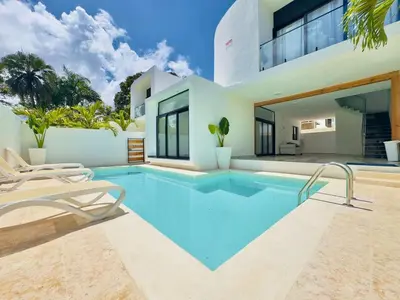 a swimming pool in the backyard of a house at Villa Las Terrenas Near Playa Bonita Pool in Las Terrenas
