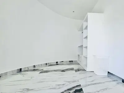 an empty room with white walls and marble floors at Villa Las Terrenas walk to Punta Popy Pool, AC in Las Terrenas