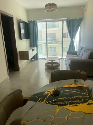 a living room with a couch and a table at BoCA DEL MAR 3 BOCA CHICA in Boca Chica