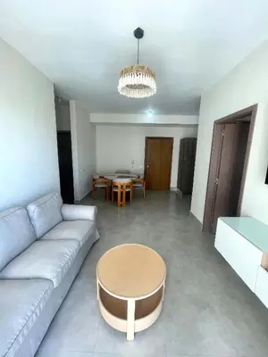a living room with a couch and a table at BoCA DEL MAR 3 BOCA CHICA in Boca Chica
