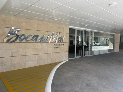 a building with a sign on the side of it at BoCA DEL MAR 3 BOCA CHICA in Boca Chica