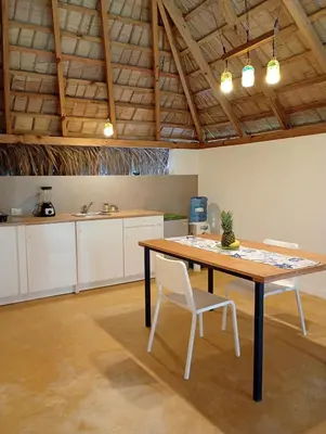 an office with a table and chairs in a room at Mejor, Quédate Aquí in Las Galeras