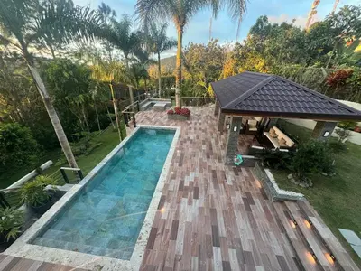 a swimming pool with a gazebo in a yard at Villa Reyes Vega - Private Pool & BBQ - La Colonia, SC in La Cabirma
