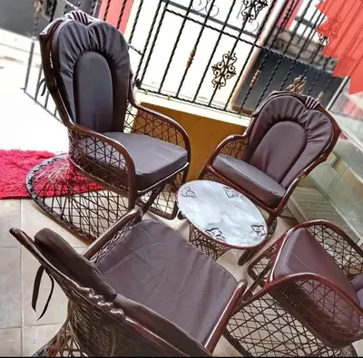 a group of chairs sitting in a room at Casamesa-14 in Los Alcarrizos