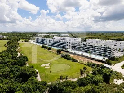 an aerial view of a resort with a golf course at Aqua Luxe Opulence Vista Piscina & Golf · by Sun5 in Punta Cana