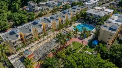 an aerial view of a resort with a swimming pool at Garden Condos APT 35 - Affordable 1BR APT in Sosua in Sosúa