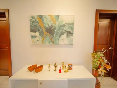 a white table in a room with a painting on the wall at COZY 7BR Villa BIG POOL Close to beach in Sosúa