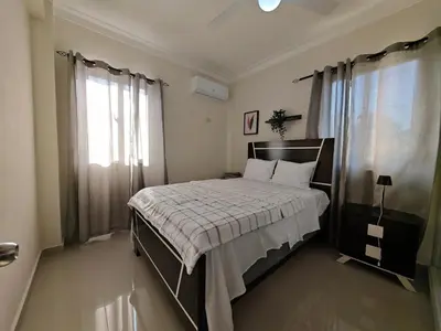 a bedroom with a bed and a window at 2 Bdrm, 1 Bath, Wifi, Near River and Beach, 4R, Paraiso, Barahona in Paraíso