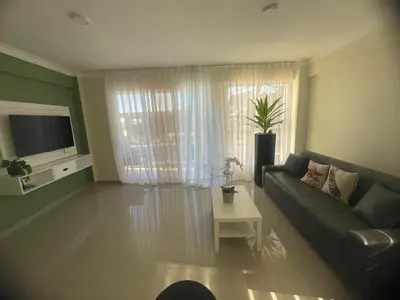 a living room with a couch and a table at 2 Bdrm, 1 Bath, Wifi, Near River and Beach, 4R, Paraiso, Barahona in Paraíso