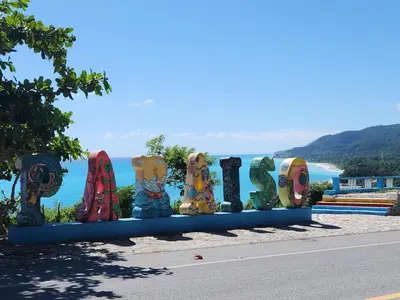 a sign that says love on the side of a road at 2 Bdrm, 1 Bath, Wifi, Near River and Beach, 4L, Paraiso, Barahona in Paraíso