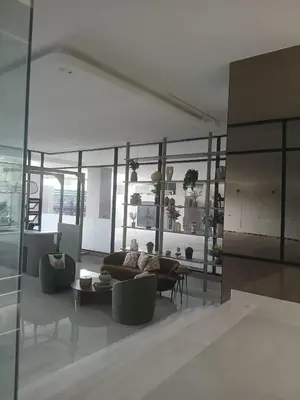 a living room with a couch and a table at a wonderful apt, close to everything you need in Santo Domingo