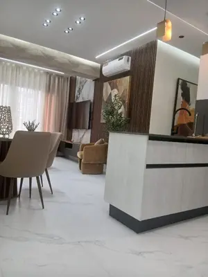 a lobby with a reception counter and chairs at Downtown, Cozy and Modern! in Santo Domingo