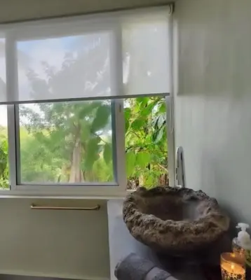 a window with a bowl in front of it at Grandi spazi vista mare piscina infinity con grotta taina in Las Terrenas