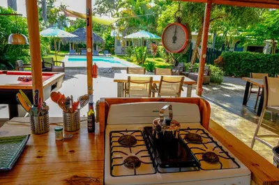a stove top oven sitting on top of a table at Hotel Enjoy in Las Terrenas