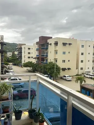 a balcony with a view of a parking lot at Garden view paradise in Concepción de La Vega