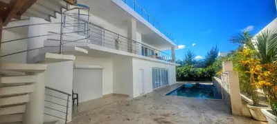 an image of a house with a spiral staircase at Villa Jasmine Ocean Village in Sosúa