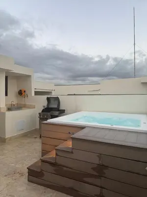 a large swimming pool on top of a building at MarMary Ocean view by Marina in Boca Chica
