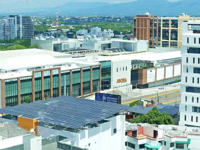 a group of buildings with solar panels on the roof at Soha Suites II Deluxe in Colorado