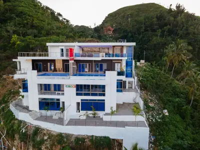an aerial view of a house on a cliff at Villas Escape in Las Terrenas