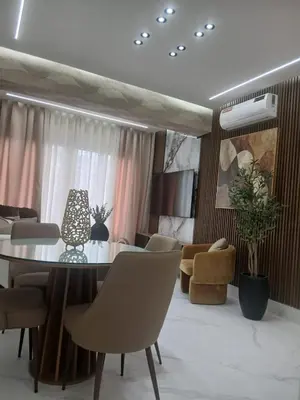 a dining room with a table and chairs at Downtown, Cozy and Modern! in Santo Domingo