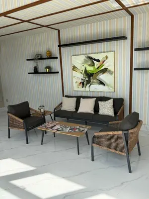 a living room with a couch and a coffee table at Downtown, Cozy and Modern! in Santo Domingo
