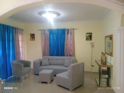 a living room with a couch and chairs at Casa vacanza, Mendosa in Bayaguana
