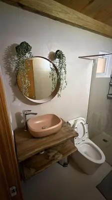 a bathroom with a sink and a toilet at Mila Apartment in Bayahibe