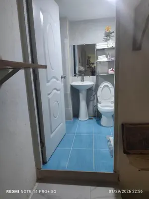 a bathroom with a toilet and a sink at housing Freddy in Santo Domingo