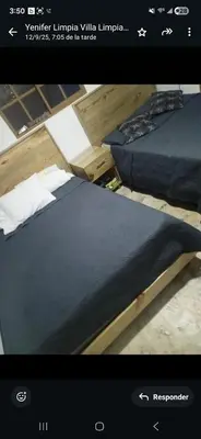 a picture of two beds in a room at Villa Manuel Rodriguez