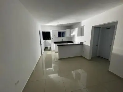 a kitchen with white walls and a white floor at apartamiento reyes in Pantoja