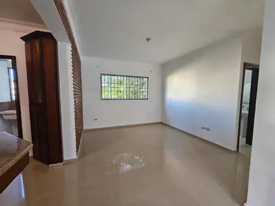 an empty living room with a window on the wall at apartamiento reyes in Pantoja