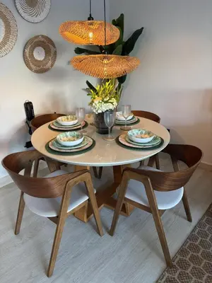 a table with plates of food on top of it at Garden Breeze Pool & Beach Escape l Bali 102 in La Laguna