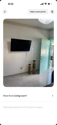 a room with a flat screen tv on a wall at Lissette altagracia in Concepción de La Vega