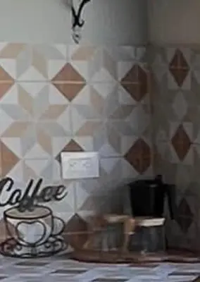 a room with a coffee cup on a table at Azotea Quinta Galarza